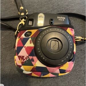 instastax camera with 4 packs of film